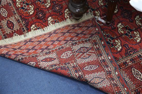 A Bokhara rug, 6ft 1in by 4ft 6in.